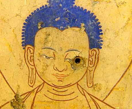 
Buddha painting with bullet hole in eye - Tibet Cry Of The Snow Lion DVD
